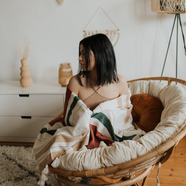 Fouta brodée avec pompons