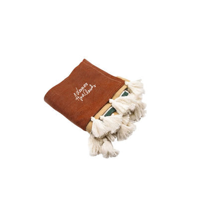 Fouta brodée avec pompons